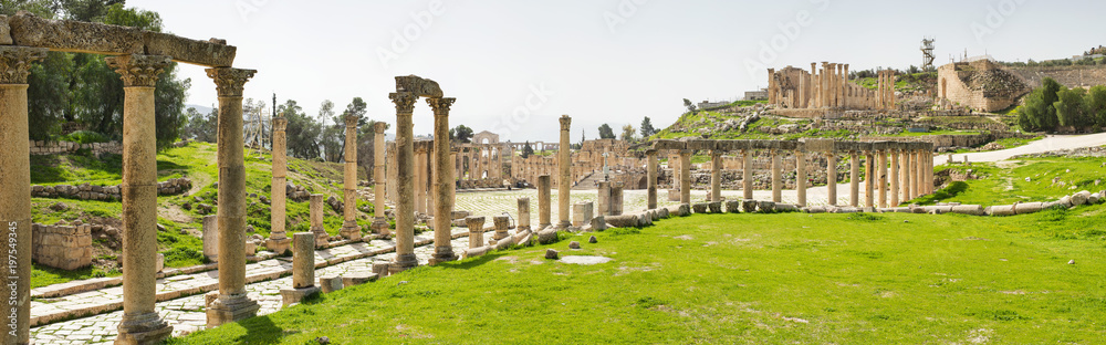 wide angle panoramic view to old ruins on street in antique town
