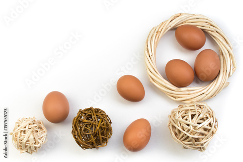 Happy Easter. eggs isolated on white background. Balls, wreath woven from the vines. Copy space for text. Top view photo