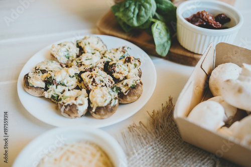 Tuscan Stuffed Mushrooms with sun-dried tomato and spinnach