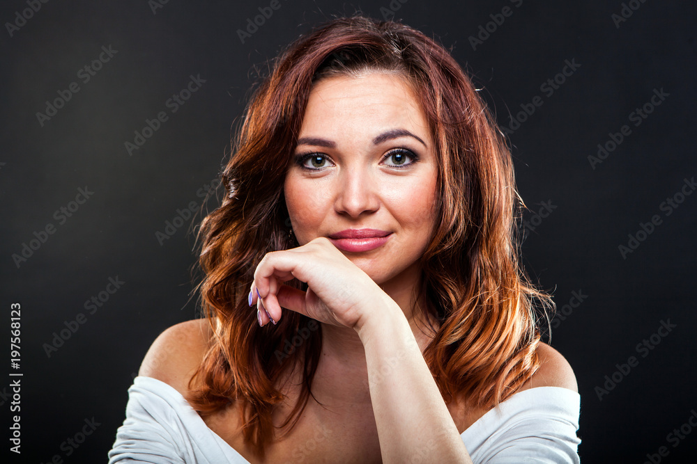 Pretty young girl on black background in studio Pretty young girl on black background in studio
