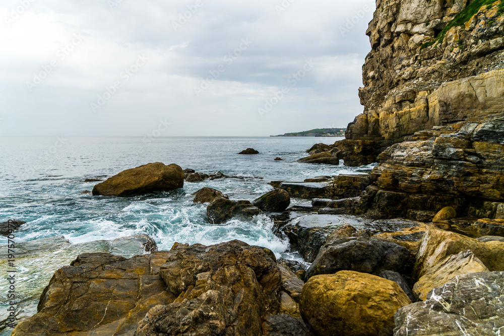 Some of the beautiful coastline of Gijon Spain on the Bay of Biscay in the province of Asturias.