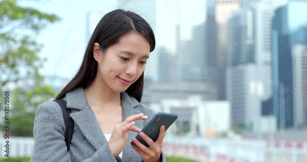 Business woman use of mobile phone for online at outdoor Business woman use of mobile phone for online at outdoor