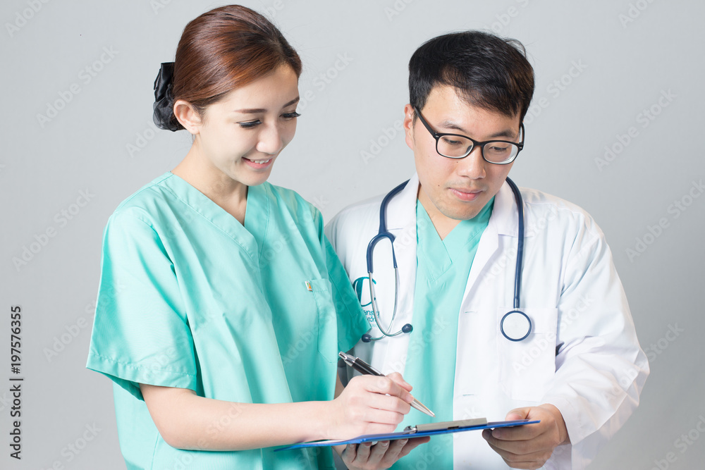 smiling Nurse and Doctor smiling Nurse and Doctor
