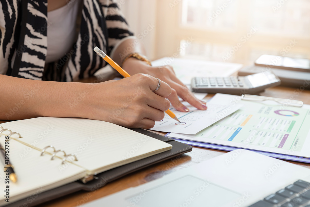 Business and finance concept of office working, Businesswoman discussing sale analysis Chart Business and finance concept of office working, Businesswoman discussing sale analysis Chart