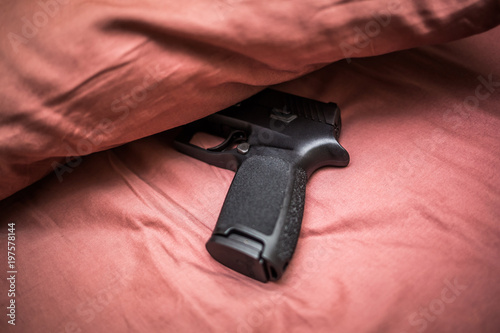 Hidden under pillow gun for personal protection