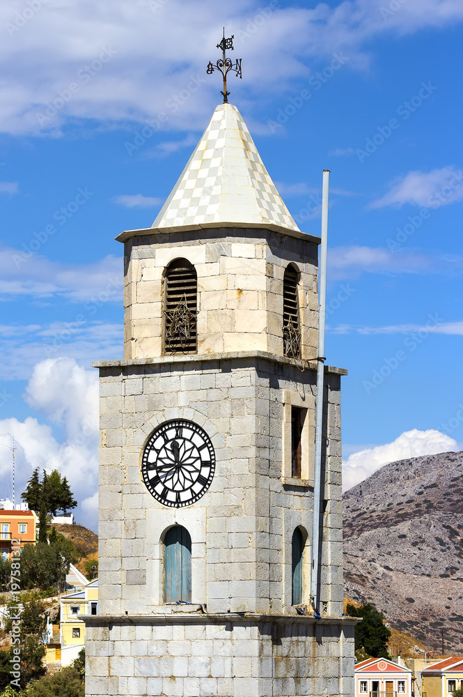 Clock tower on the docks of Symi island, Dodecanesse, Greece