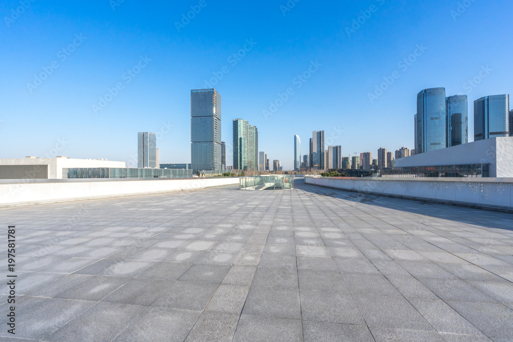 empty floor with modern building in urban empty floor with modern building in urban