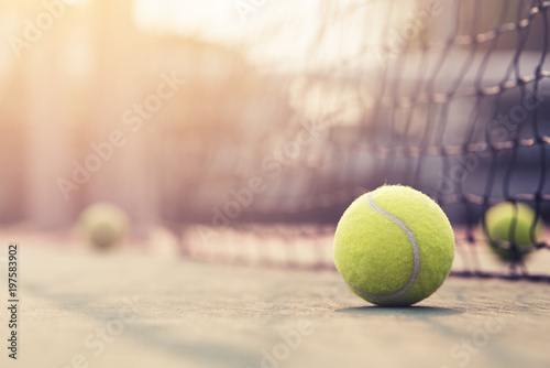 Tennis ball hitting the tennis net at tennis court with copy space.