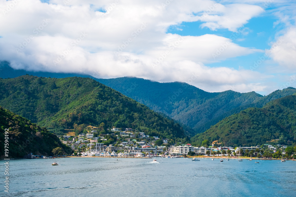 Beautiful landscape of blue ocean and City of Picton among the green nature.