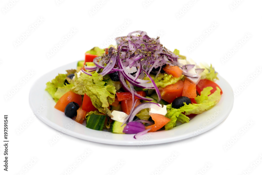 Salad of vegetables on the table isolated on white. Vegetarian vitamin diet food from vegetation. 