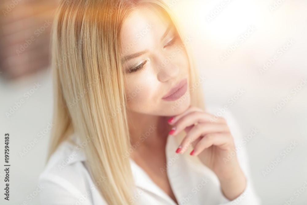closeup face of a beautiful young woman closeup face of a beautiful young woman
