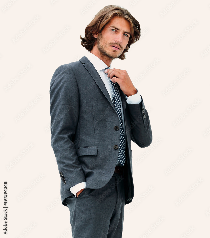 businessman straightening his tie isolated on a white background businessman straightening his tie isolated on a white background
