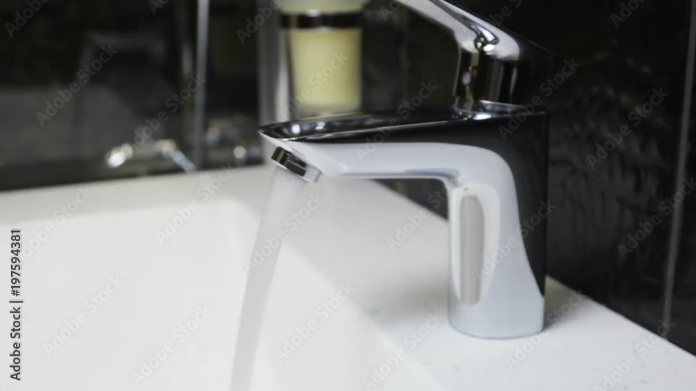 water faucet in a luxurious hotel room or at home in the bathroom. Dolly video water faucet in a luxurious hotel room or at home in the bathroom. Dolly video