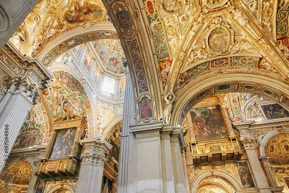Bergamo, Italy - August 18, 2017: Bergamo's Basilica di Santa Maria Maggiore, ornate gold interior.