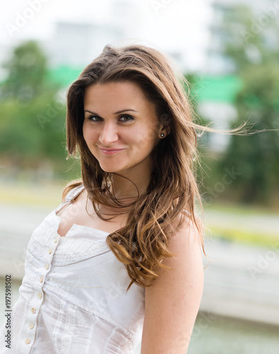  beautiful european woman smiling outdoors
