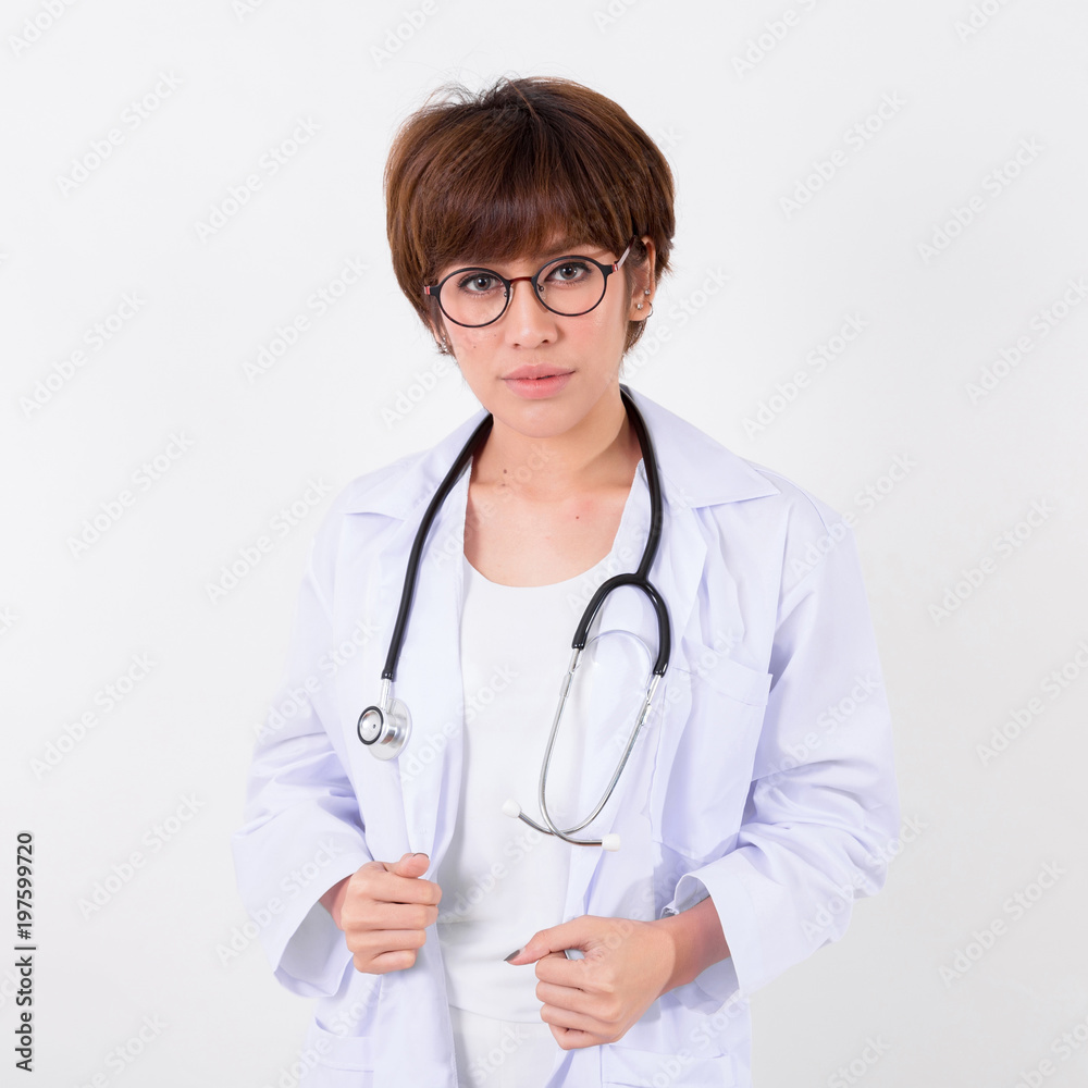 Young Asia Doctor with stethoscope. Isolated on white background. Studio lighting. Concept for healthy Young Asia Doctor with stethoscope. Isolated on white background. Studio lighting. Concept for healthy