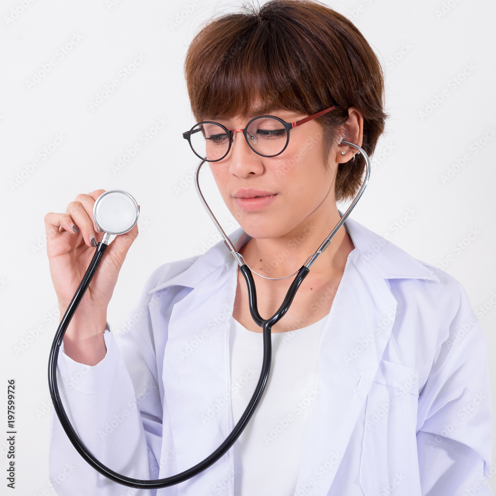 Young Asia Doctor with stethoscope. Isolated on white background. Studio lighting. Concept for healthy Young Asia Doctor with stethoscope. Isolated on white background. Studio lighting. Concept for healthy