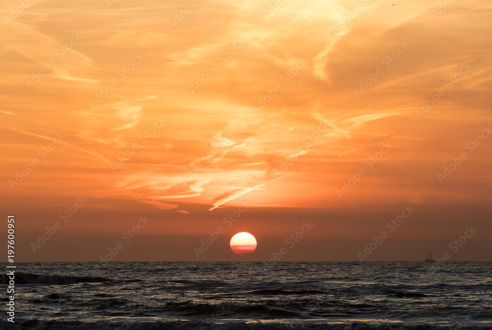 Scenic View Of Sea Against Orange Sky