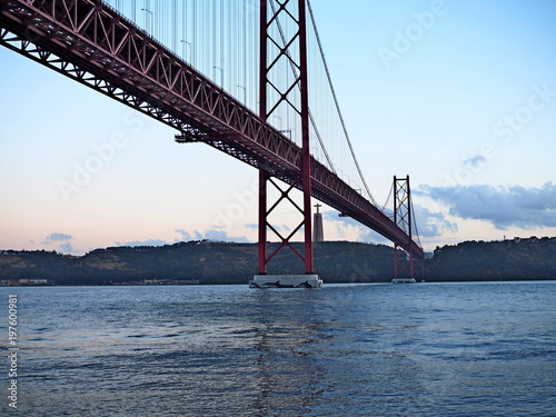 Fototapeta Naklejka Na Ścianę i Meble -  25th of April Suspension Bridge over the Tagus river in Lisbon, Portugal	