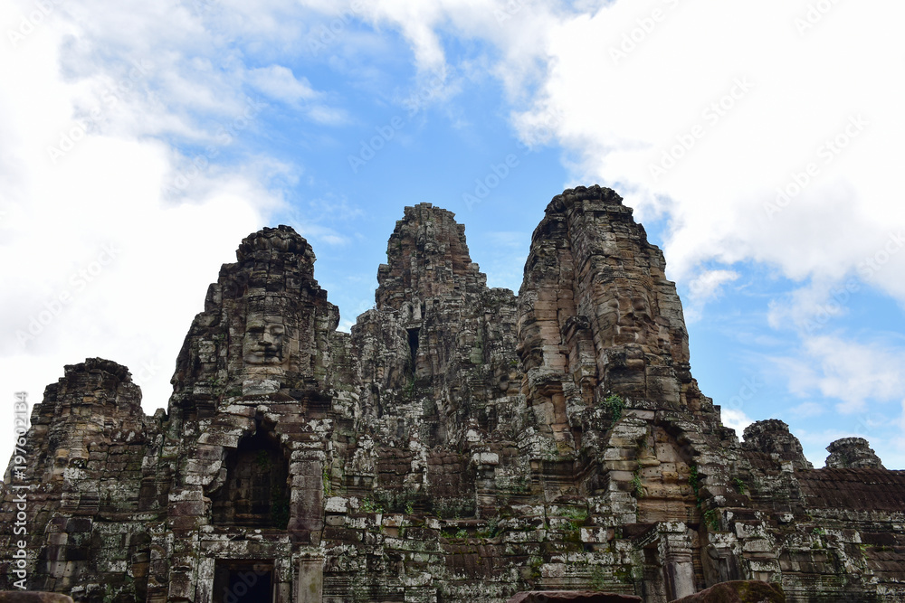 Ancient stone faces of Bayon temple, Angkor, Cambodia Ancient stone faces of Bayon temple, Angkor, Cambodia