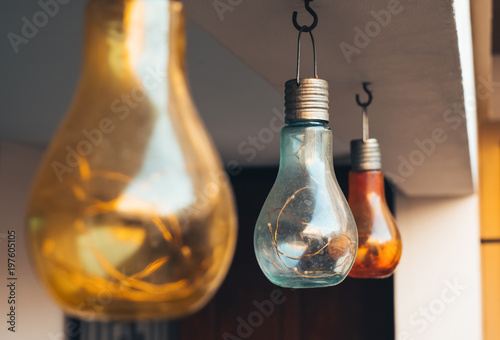 Old electric light hanging on the beam at the home, Vintage