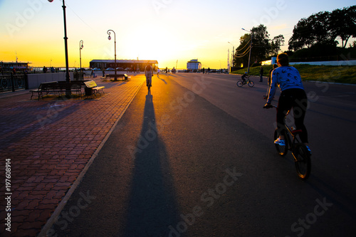 young people riding a bike