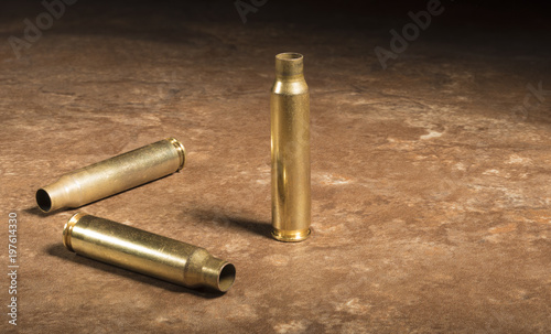 Trio of empty AR-15 cartridges on the floor