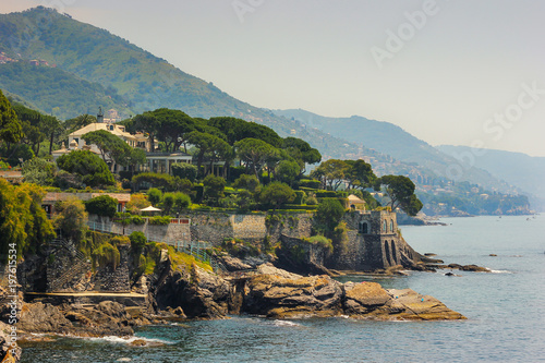 Seascape with the Mediterranean rocky coastline and promenade at Genoa Nervi, Liguria, Italy