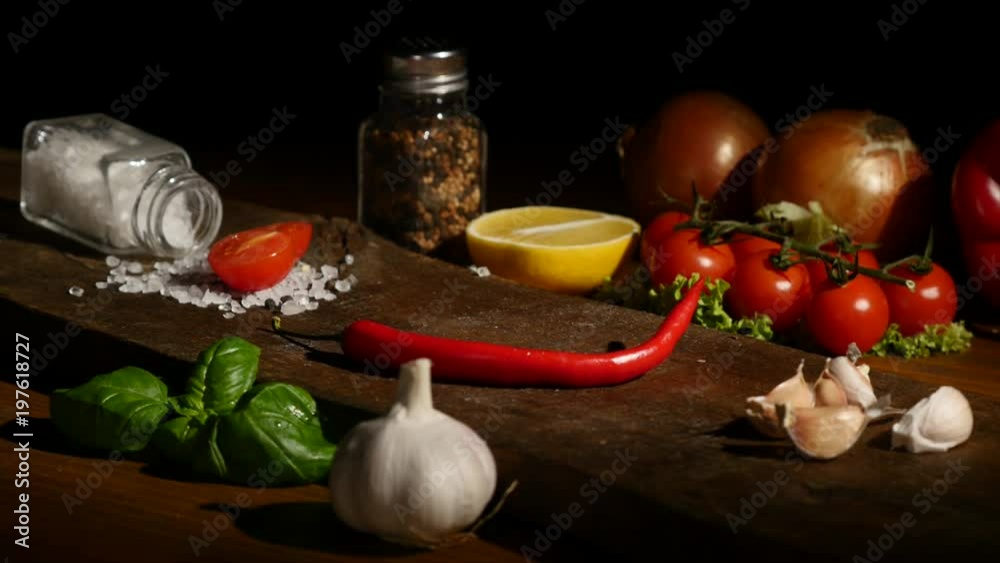 hand puts hot pepper on a board