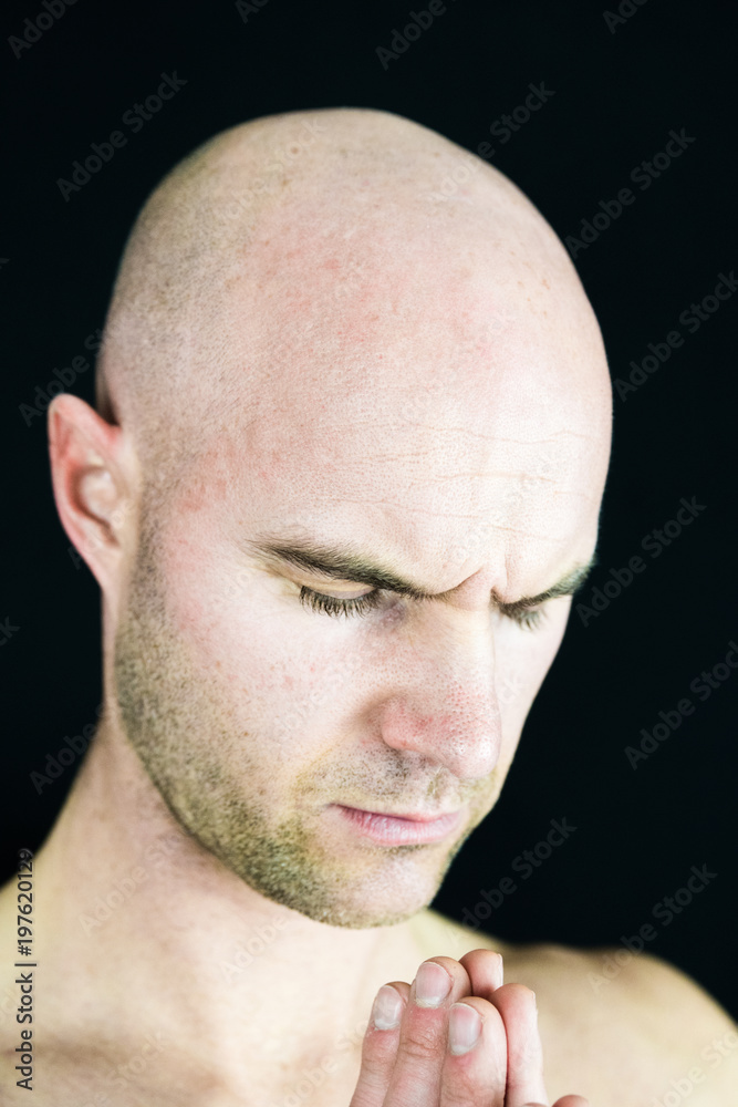 Naklejka premium Muscular man performs Yoga and meditation