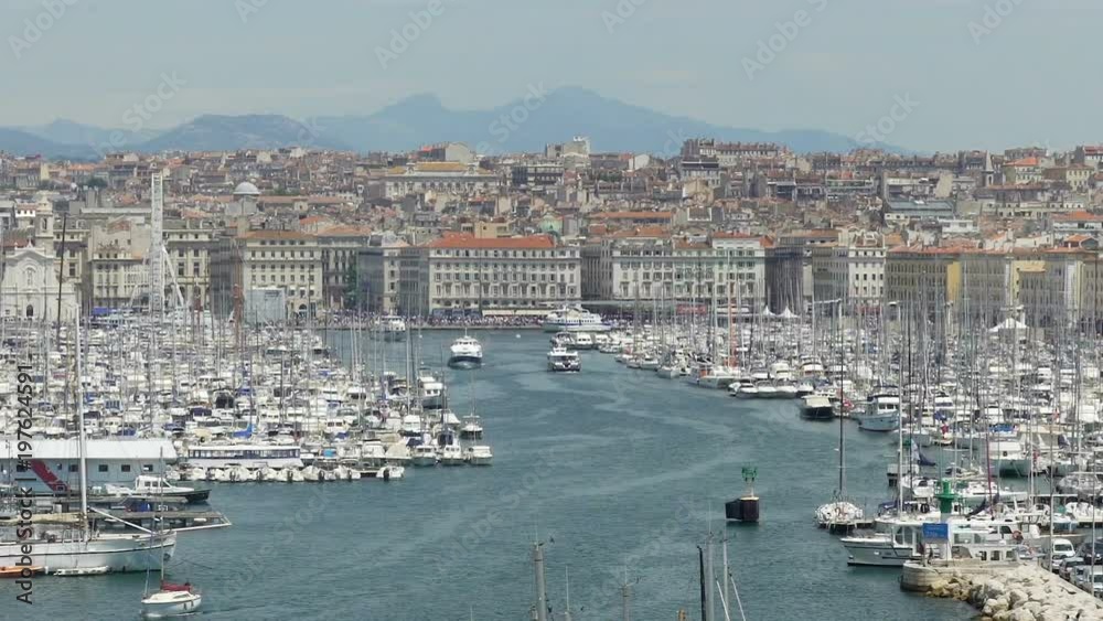 Yachts and boats in harbor of Marseille, historic landmark, tourism sightseeing Yachts and boats in harbor of Marseille, historic landmark, tourism sightseeing