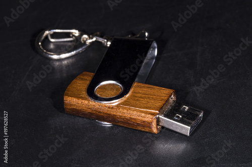 wooden flash drive on a chalkboard close-up, background image