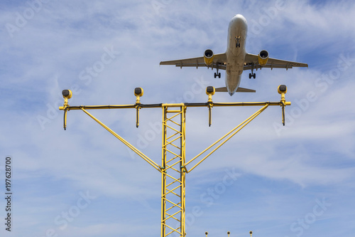 A plane about to land, El Prat de Llobregat, province Barcelona,Catalonia, Spain.