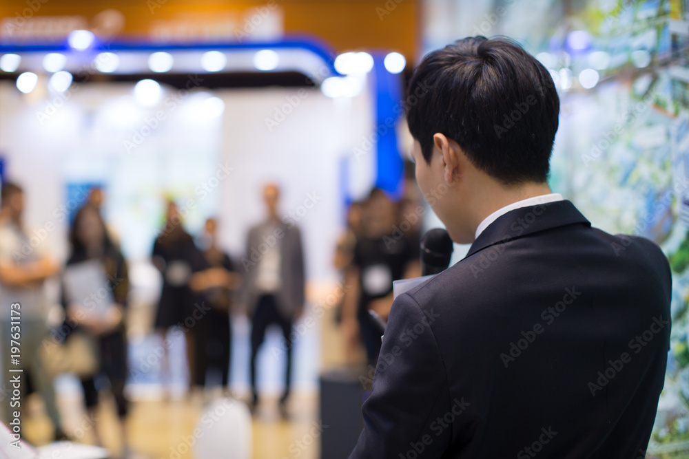 Man in Suit Giving Business Presentation Man in Suit Giving Business Presentation