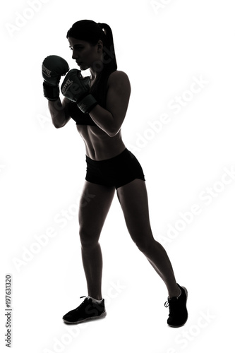 One caucasian woman boxing exercising in silhouette isolated on white background
