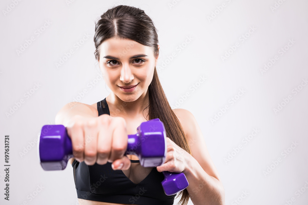 Nice young fitneess woman with dumbbells isolated on white background Nice young fitneess woman with dumbbells isolated on white background