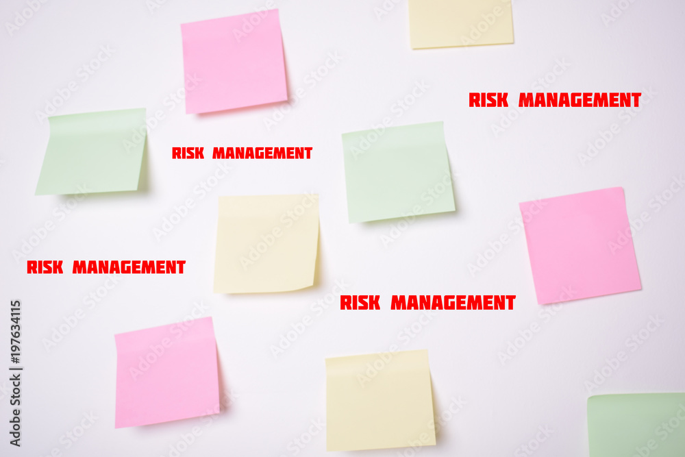 Stickers on the wall with the inscriptions:RISK MANAGEMENT Stickers on the wall with the inscriptions:RISK MANAGEMENT