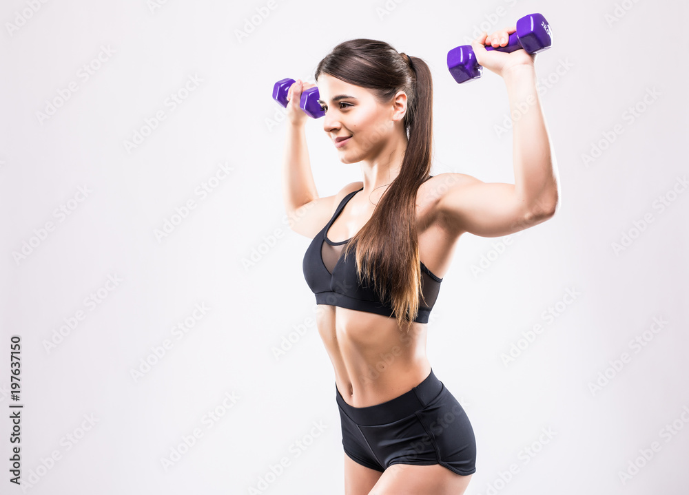 © F8 \ Suport Ukraine - Fitness woman exercising crossfit holding dumbbell strength training biceps working out with dumbbell over white background © F8 \ Suport Ukraine - Fitness woman exercising crossfit holding dumbbell strength training biceps working out with dumbbell over white background