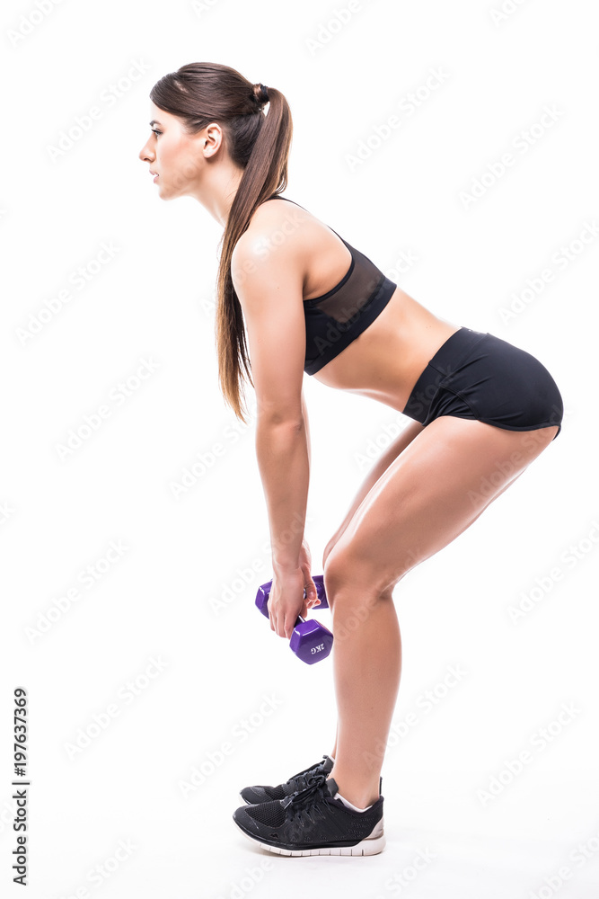 Young sporty muscular woman doing squats isolated over white background. Woman in sport clothing performing exercise Young sporty muscular woman doing squats isolated over white background. Woman in sport clothing performing exercise
