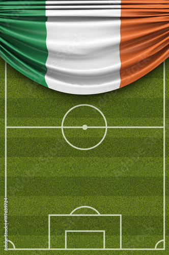 Ireland country flag draped over a football soccer pitch. 3D Rendering