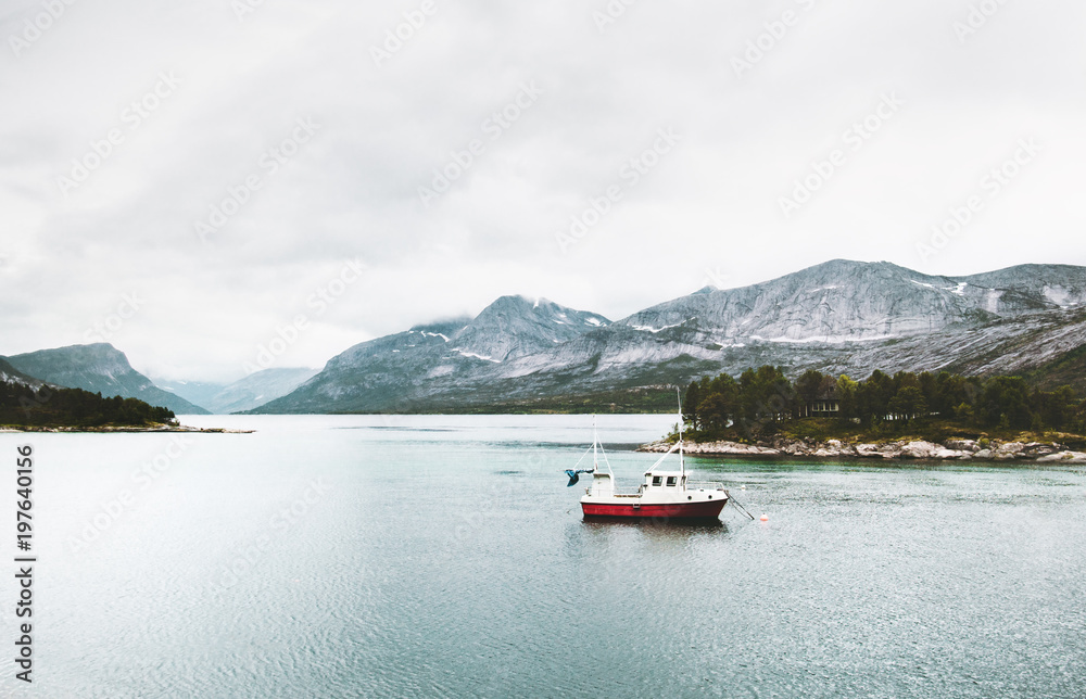 Mountains and fishing boat sea Landscape wild nature in Norway scandinavian Travel