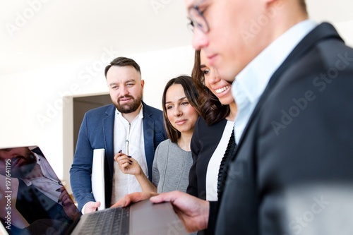 Designers show the interior design project to their team