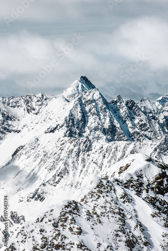 The Alpine highlands. Snow-capped mountain peaks. Beautiful scenery