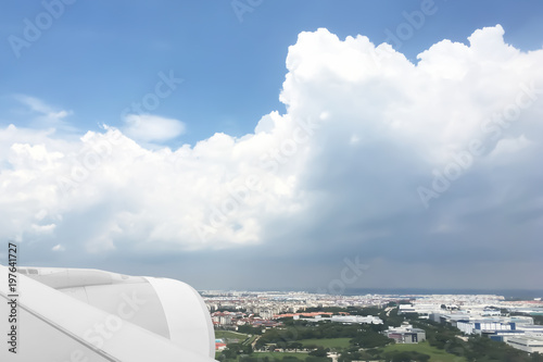 Landscape panorama of City Skyline View from the aircraft with dramatic atmosphere of sky and clouds.
