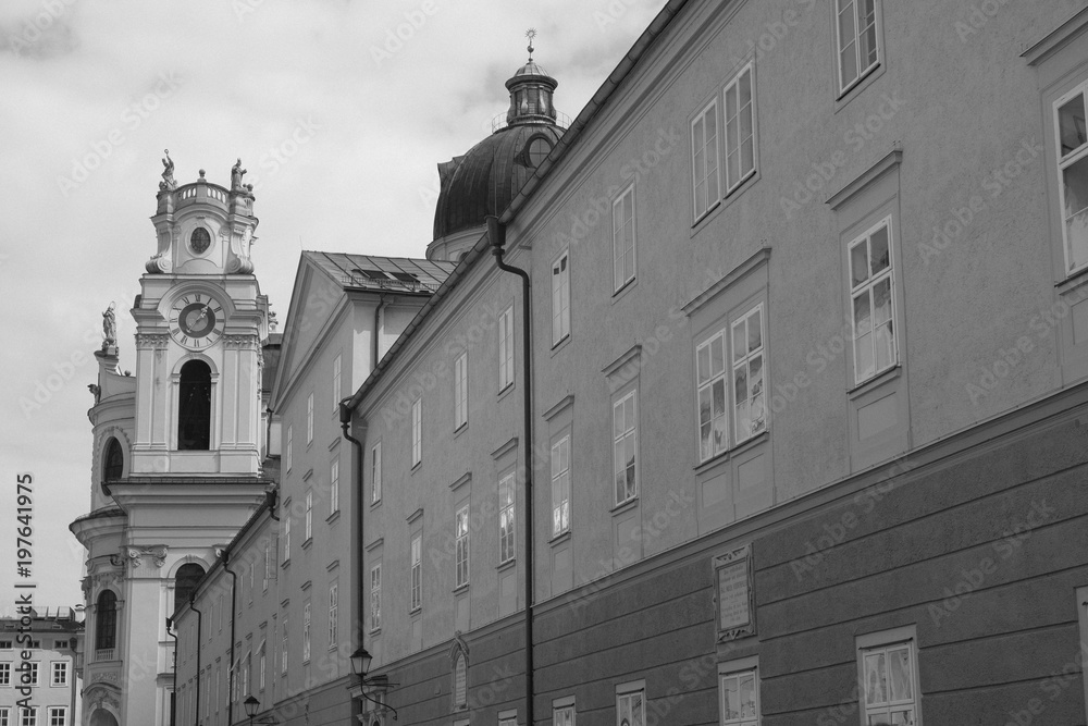 clock tower and wall black and white picture