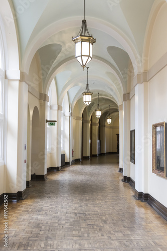 Empty vintage corridor with hanging lights