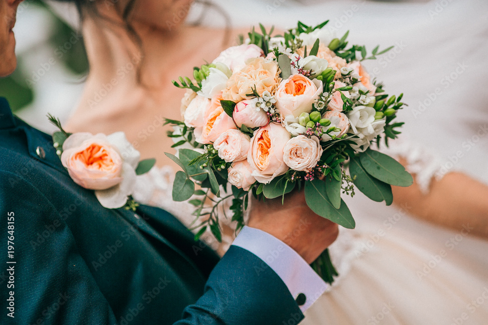 wedding bouquet in bride's hands, david austin