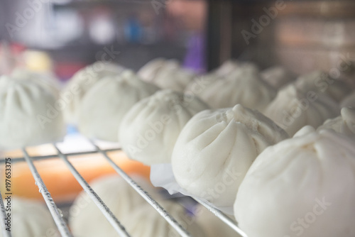 steamed stuff bun favorite tradtional chinese food in asia.It is a popular snack sold mostly in Chinese restaurants.Another name is Siopao made from a combination of pork, chicken, beef, shrimp.