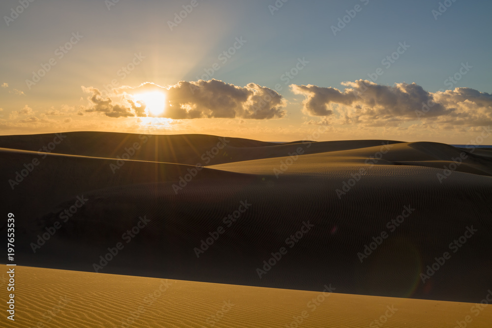 Rippled and smooth sand of dunes of Maspalomas in Gran Canaria.