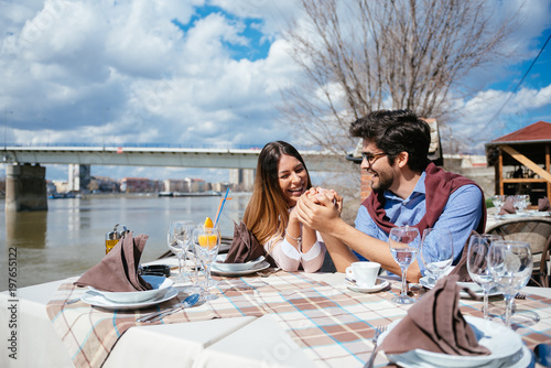 Young love couple on a romantic date at a cafe. Outdoors, love, romance © AH! Studio